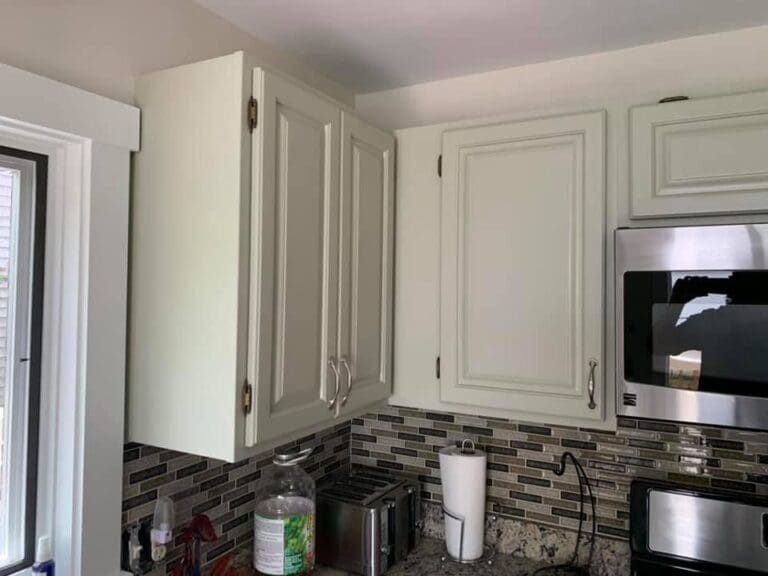 Jag Painting Team Cabinets in Kitchen